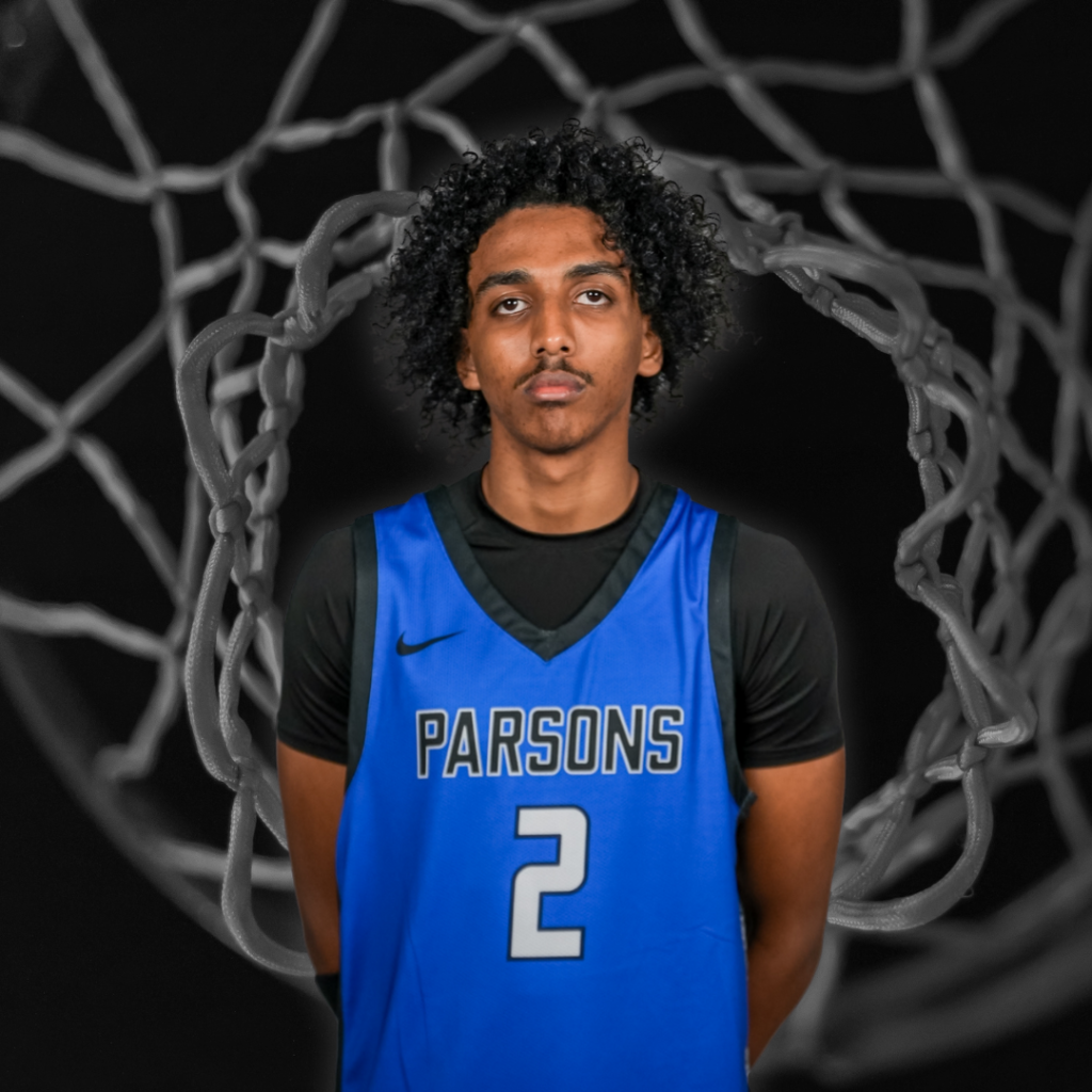 a basketball player standing for a portrait